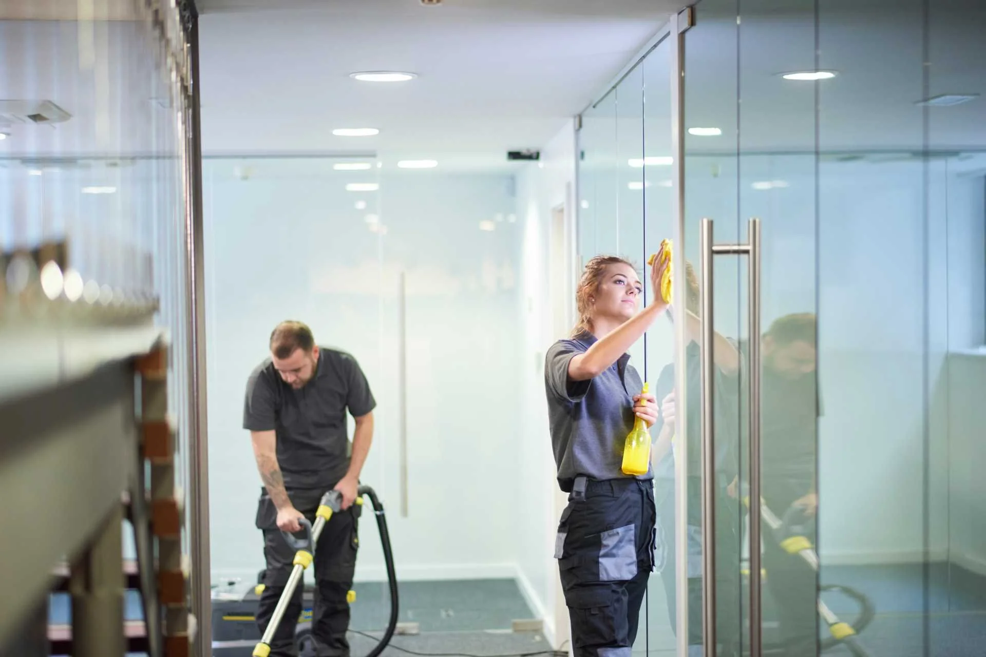 Professional commercial cleaning services in Dallas TX - Janitorial Services of Dallas team cleaning corporate office